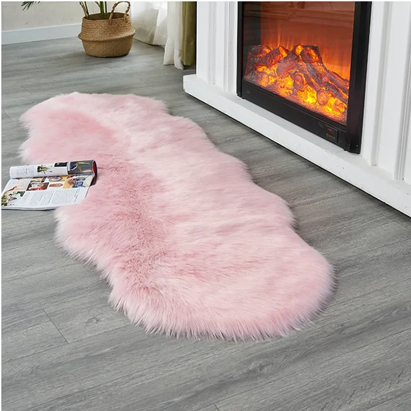 Soft pink fur sheepskin style area rug